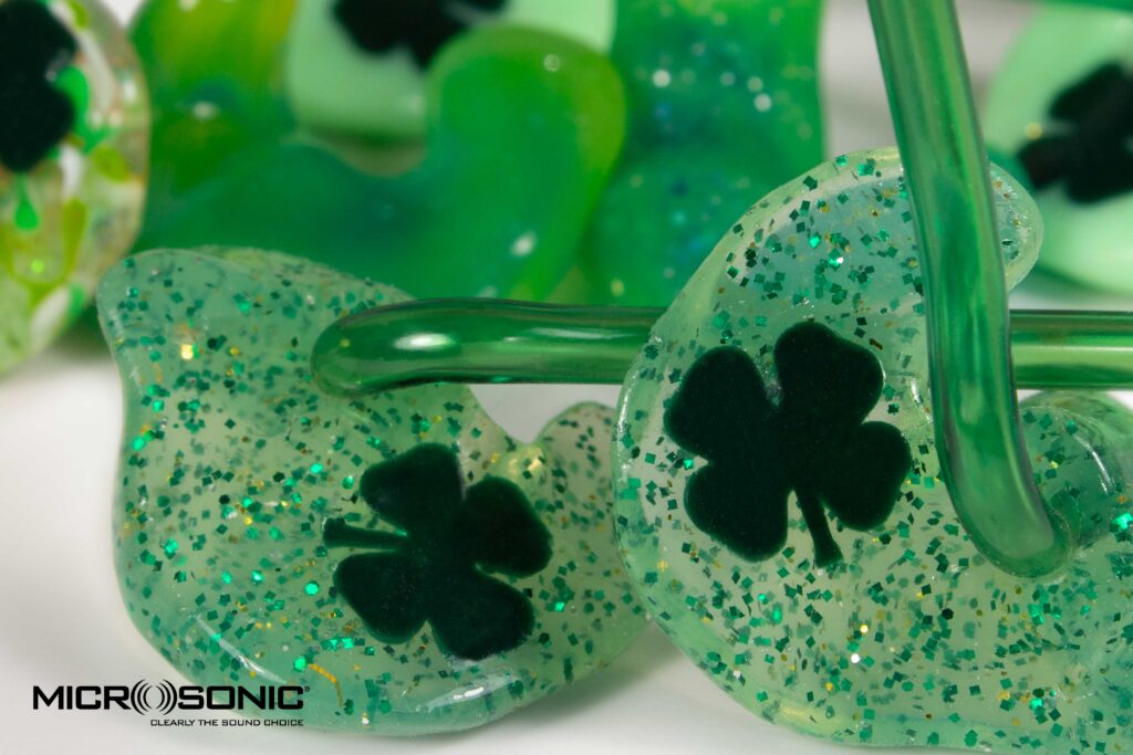 microsonic earmolds with shamrock logo